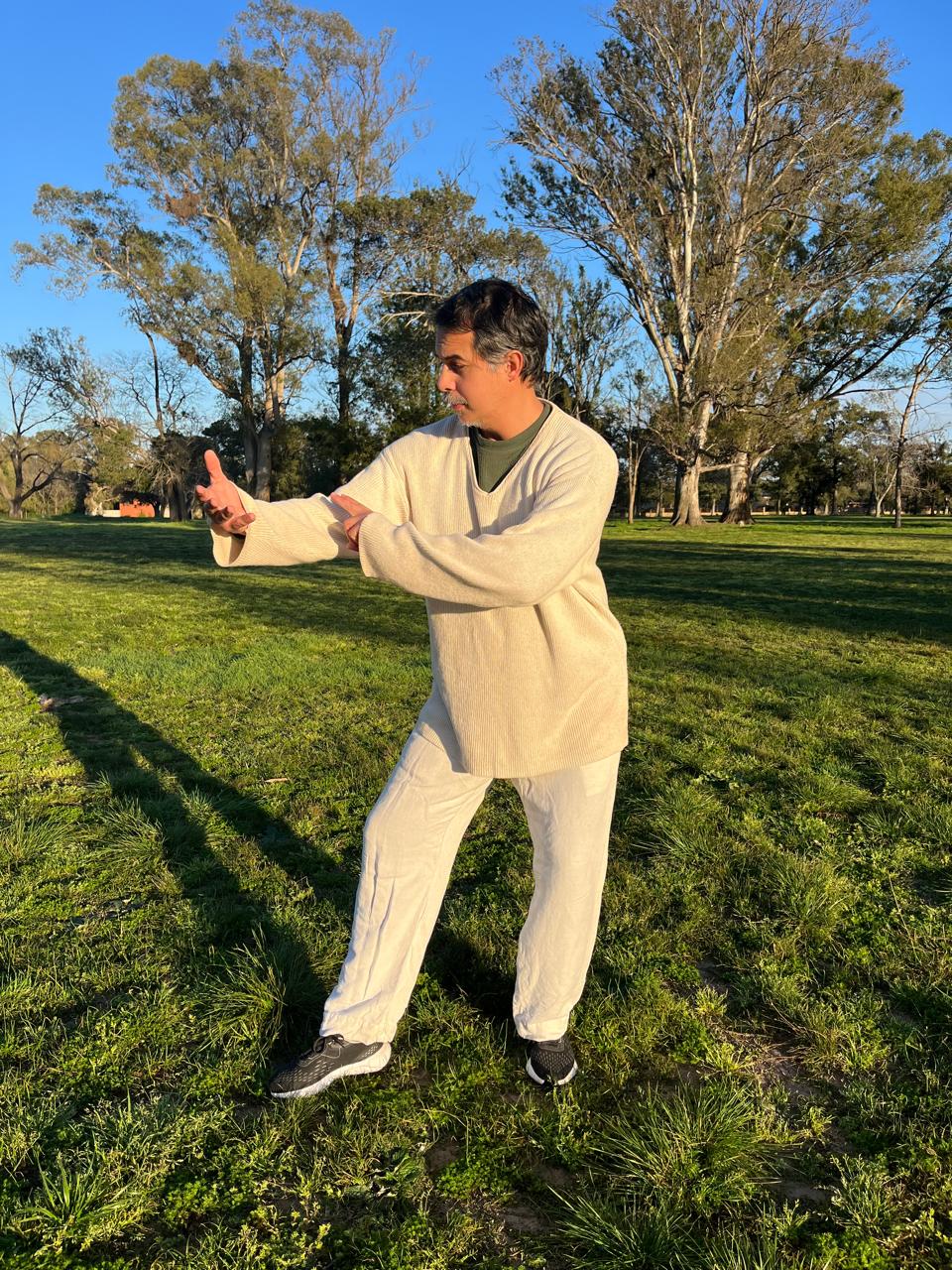 Gabriel Nieto practicing qigong outdoors
